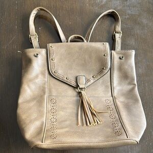 Elegant Tan Backpack with Tassel Detail